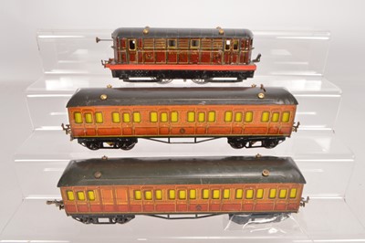 Lot 472 - Hornby 0 Gauge Metropolitan 2 Clockwork Locomotive & coaches (3)