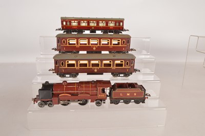 Lot 494 - Hornby 0 Gauge Locomotive and Passenger rolling stock (4)