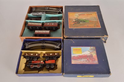 Lot 555 - Hornby 0 Gauge M1 Goods Set & No. 501 Passenger Set (2)