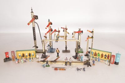 Lot 683 - Dinky Toy for Hornby 0 Gauge Passenger and Train Staff boxed Figure sets together with various  0 gauge and larger loose figures and street Furniture and various tinplate Signals (40+)