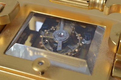 Lot 3 - A sweet small brass carriage repeater clock