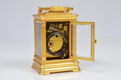 Lot 3 - A sweet small brass carriage repeater clock