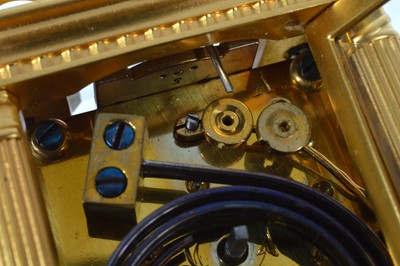 Lot 3 - A sweet small brass carriage repeater clock