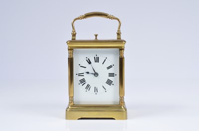 Lot 14 - An early 20th century brass carriage repeater timepiece