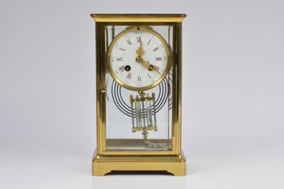 Lot 17 - A French late 19th century brass mantle clock