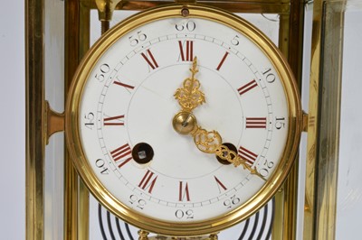 Lot 17 - A French late 19th century brass mantle clock