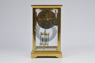 Lot 17 - A French late 19th century brass mantle clock