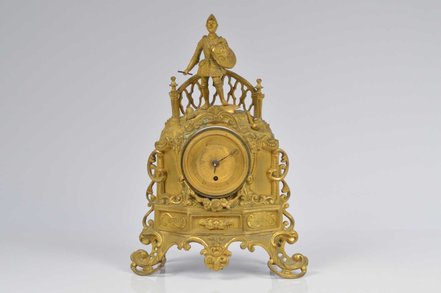 Lot 24 - A damaged French gilt mantle clock