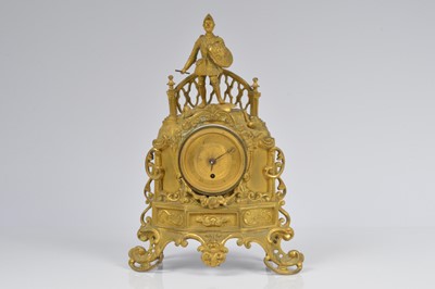 Lot 24 - A damaged French gilt mantle clock
