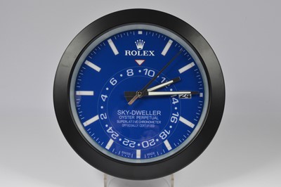 Lot 25 - A modern Watch Dealership style wall clock