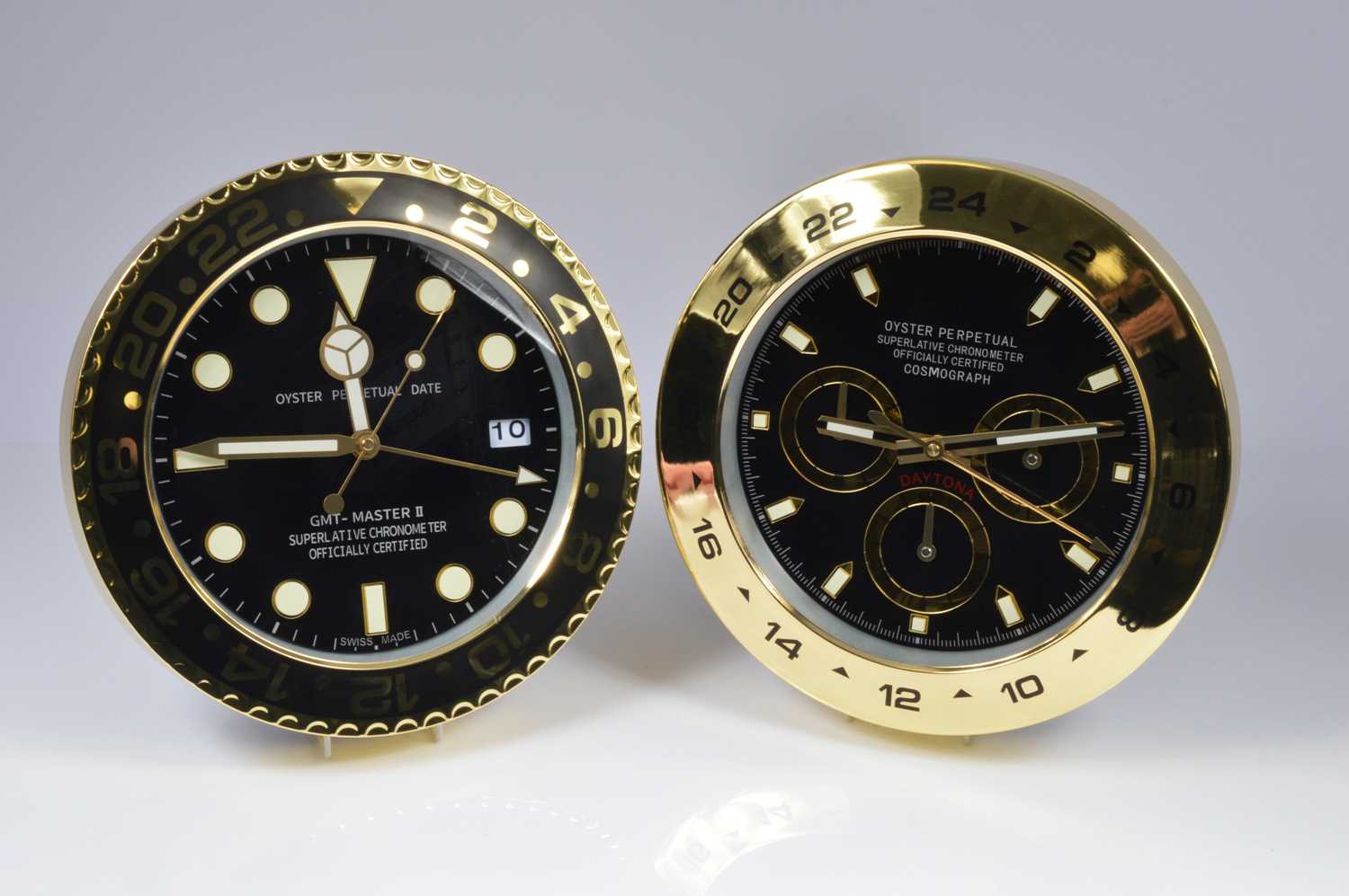 Lot 31 - A pair of modern Watch Dealership style wall clocks
