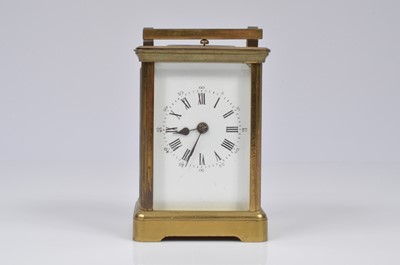 Lot 33 - A brass carriage repeater timepiece