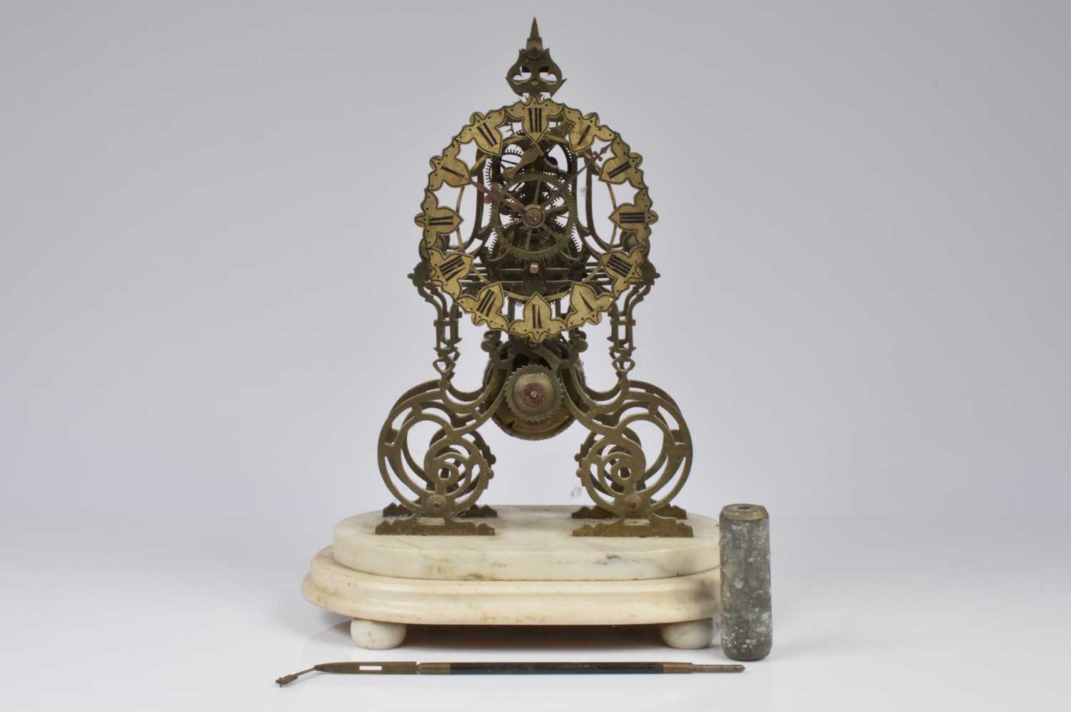 Lot 35 - An early 20th century skeleton clock