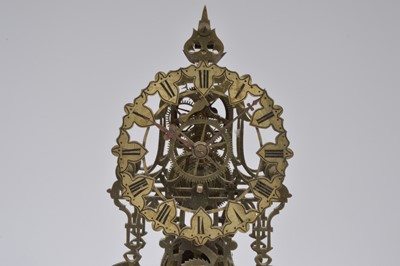 Lot 35 - An early 20th century skeleton clock