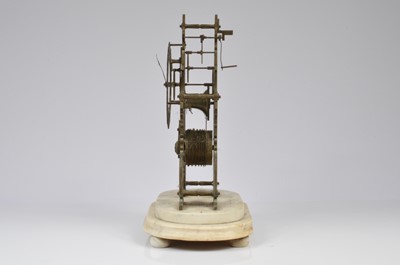 Lot 35 - An early 20th century skeleton clock