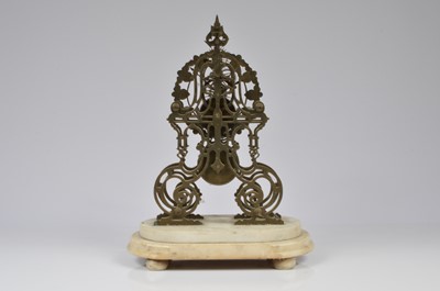 Lot 35 - An early 20th century skeleton clock