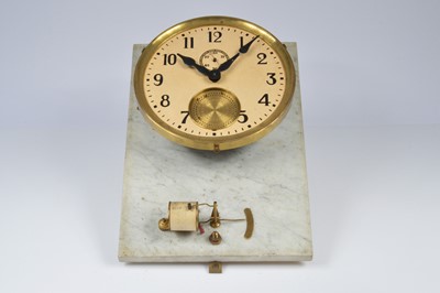 Lot 40 - An early 20th century electric wall clock
