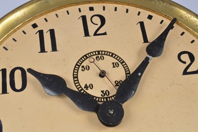 Lot 40 - An early 20th century electric wall clock