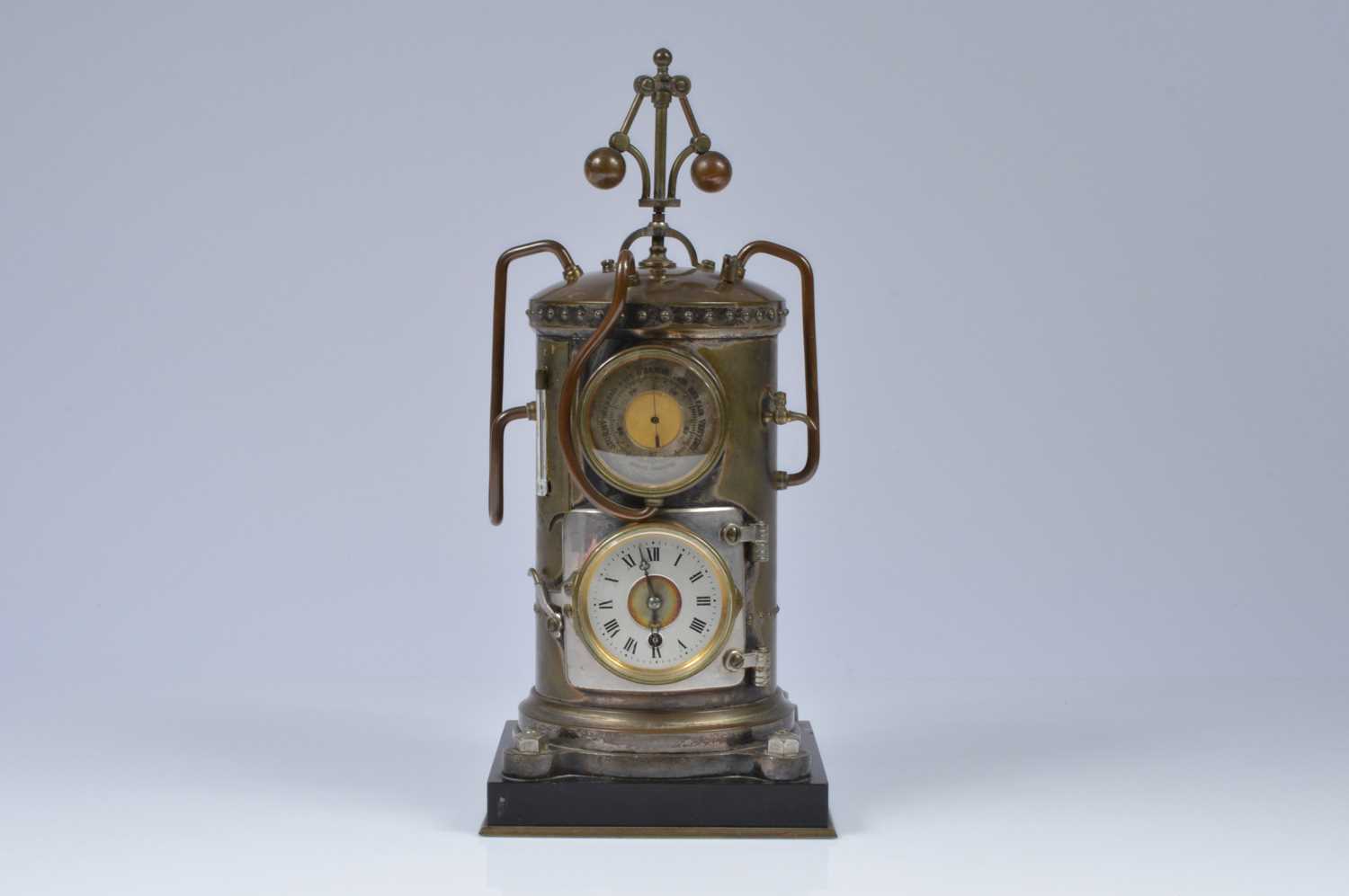Lot 53 - A late 19th century French vertical steam boiler mantle clock