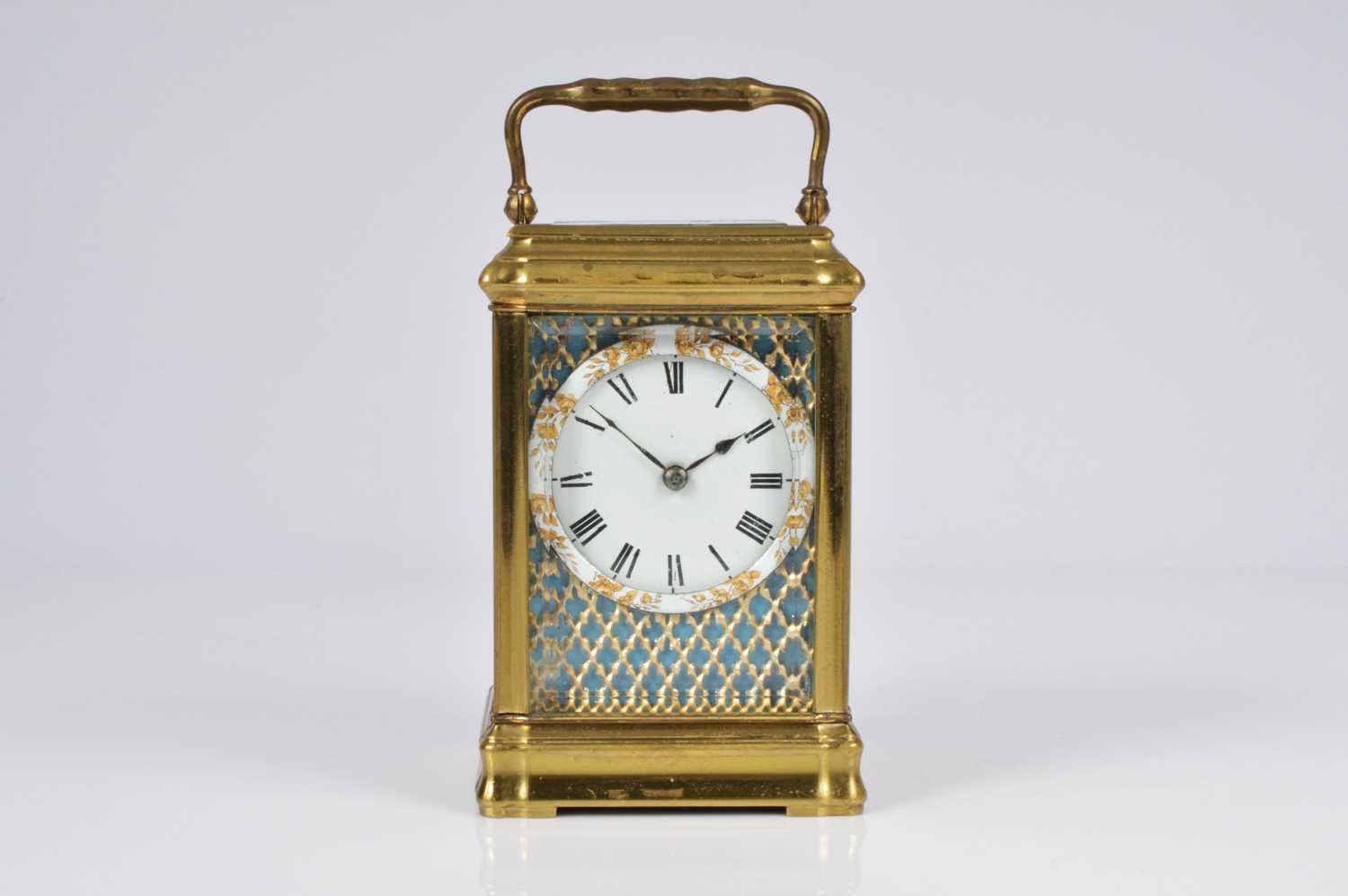 Lot 63 - A pretty early 20th century French brass and enamel plaque carriage timepiece