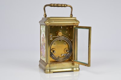 Lot 63 - A pretty early 20th century French brass and enamel plaque carriage timepiece