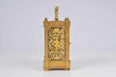 Lot 64 - A pretty early 20th century French brass carriage timepiece