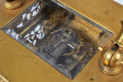 Lot 64 - A pretty early 20th century French brass carriage timepiece