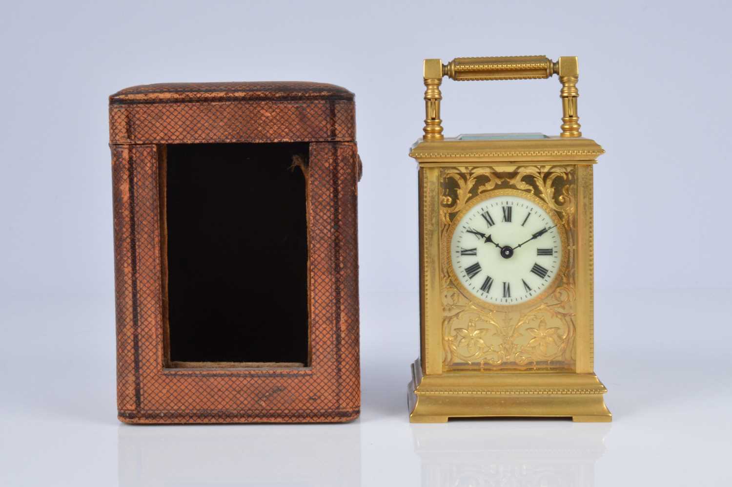 Lot 65 - An early 20th century brass carriage timepiece