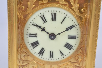 Lot 65 - An early 20th century brass carriage timepiece