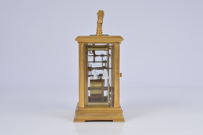 Lot 65 - An early 20th century brass carriage timepiece