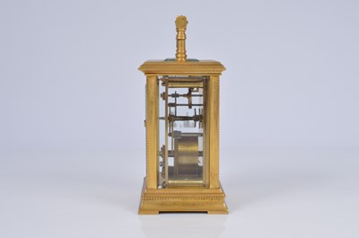 Lot 65 - An early 20th century brass carriage timepiece