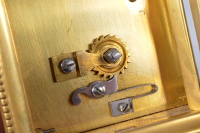 Lot 65 - An early 20th century brass carriage timepiece