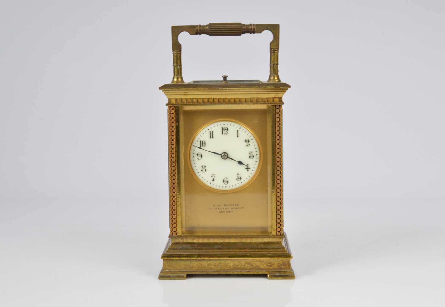 Lot 66 - An early 20th century brass repeater carriage timepiece