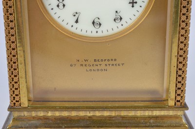 Lot 66 - An early 20th century brass repeater carriage timepiece