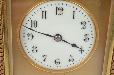 Lot 66 - An early 20th century brass repeater carriage timepiece