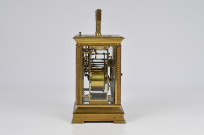 Lot 66 - An early 20th century brass repeater carriage timepiece