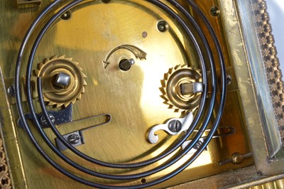 Lot 66 - An early 20th century brass repeater carriage timepiece