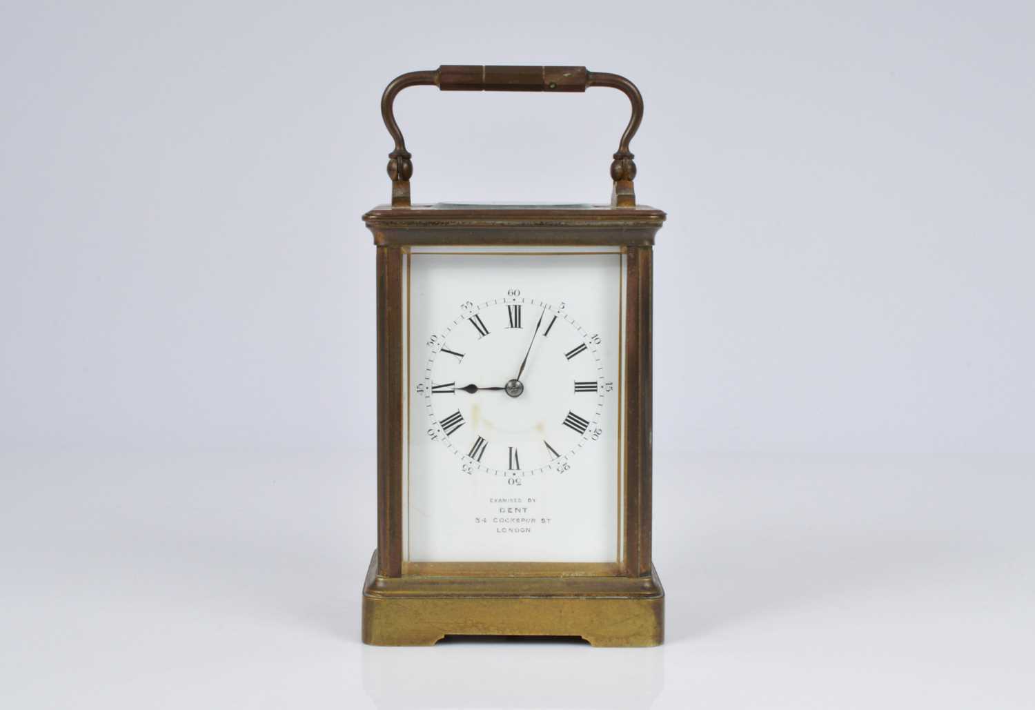 Lot 67 - An early 20th century brass carriage timepiece