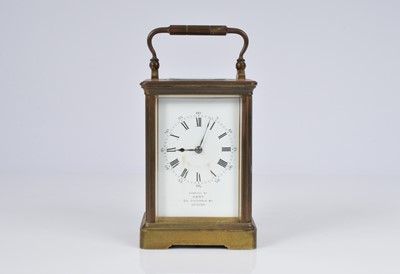Lot 67 - An early 20th century brass carriage timepiece
