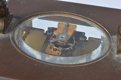 Lot 67 - An early 20th century brass carriage timepiece