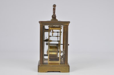 Lot 67 - An early 20th century brass carriage timepiece