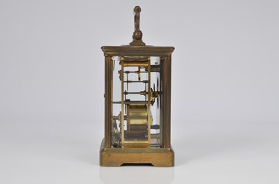 Lot 67 - An early 20th century brass carriage timepiece