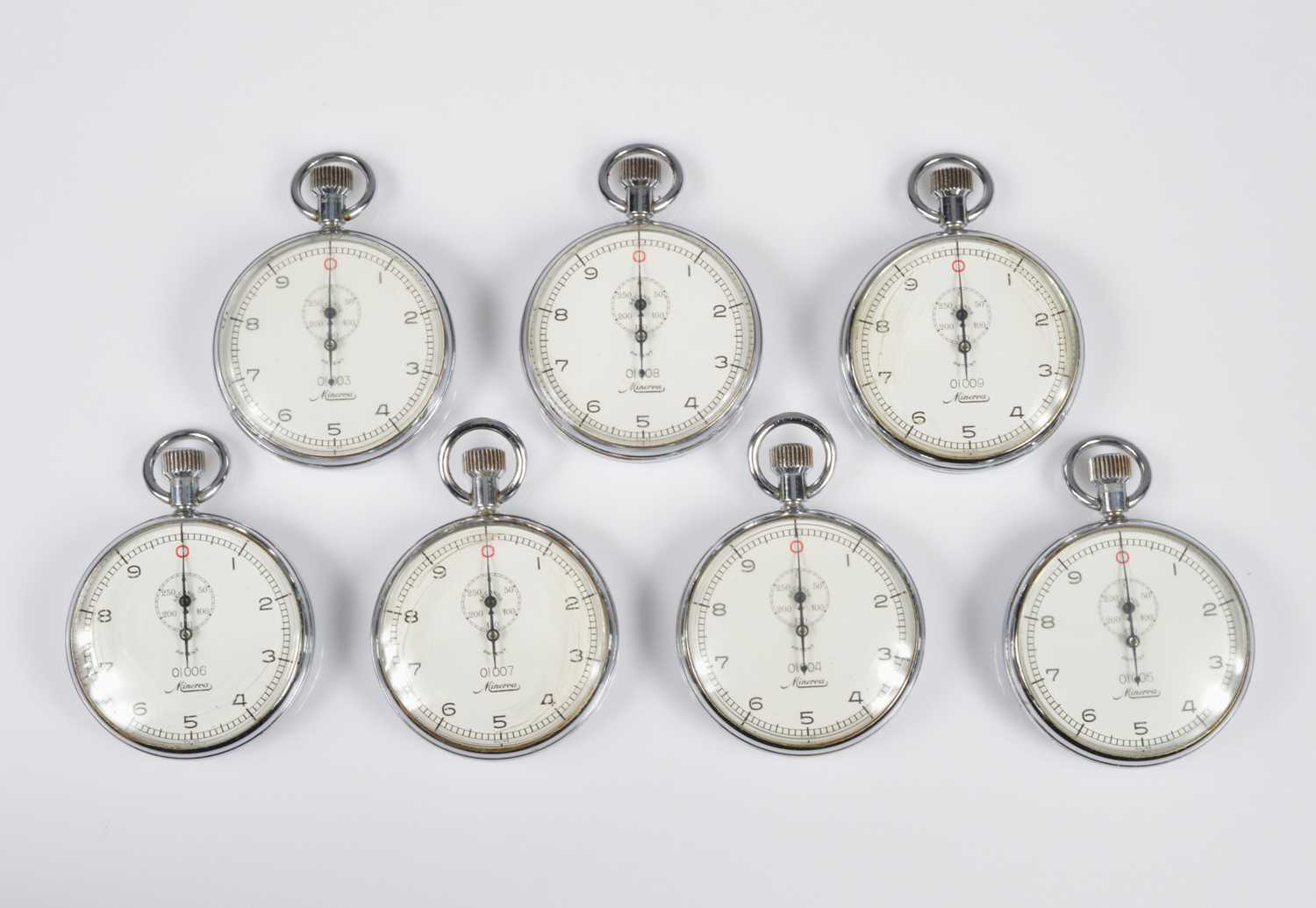 Lot 77 - A set of seven Minerva stopwatches