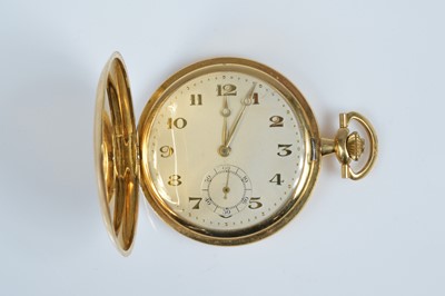 Lot 84 - A 1920s 18ct gold full hunter pocket watch
