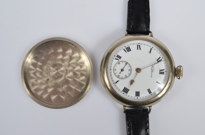 Lot 94 - A late 19th century Limit British Railway nickel manual top wind open face pocket watch and a Waltham wristwatch