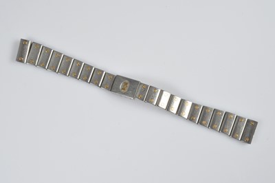 Lot 110 - An early 21st century Cartier stainless steel and gold lady's wristwatch bracelet