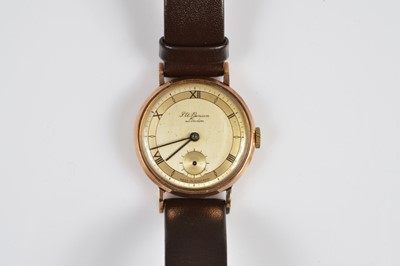 Lot 111 - A 1950s J.W. Benson manual wind 9ct gold cased wristwatch