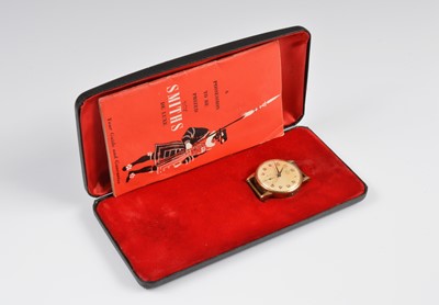 Lot 115 - A 1960s Smiths De Luxe manual wind 9ct gold cased wristwatch head