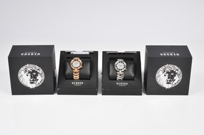 Lot 145 - A pair of modern Versace Versus wristwatches