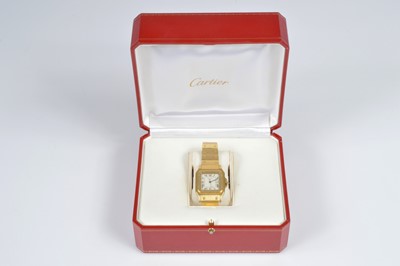 Lot 175 - A 1990s Cartier Santos automatic 18ct gold wristwatch